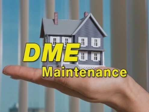 Professional chimney cleaning technician working on roof in Roosevelt, NY