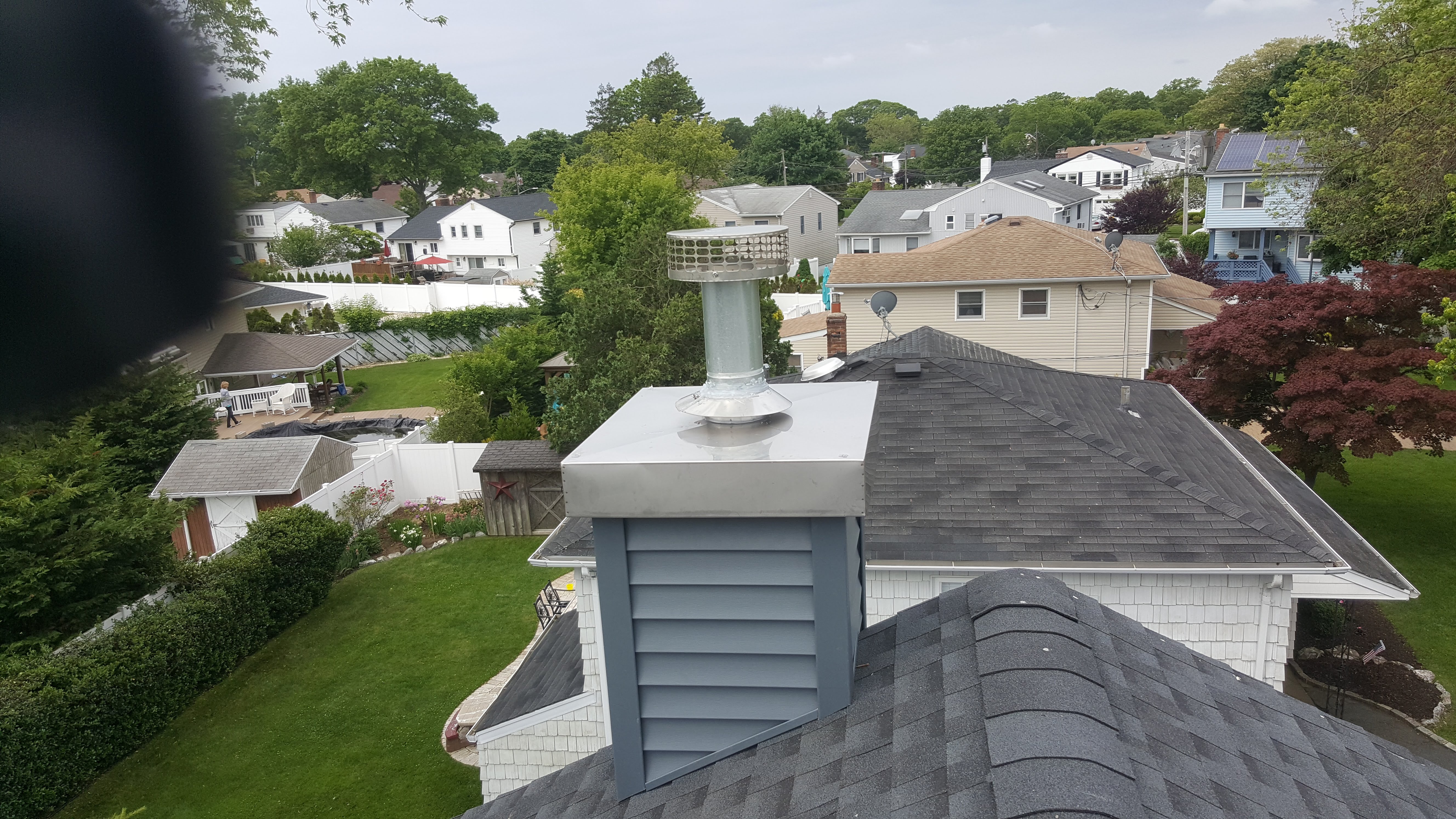 Complete chimney crown rebuild and waterproofing in Roosevelt, New York