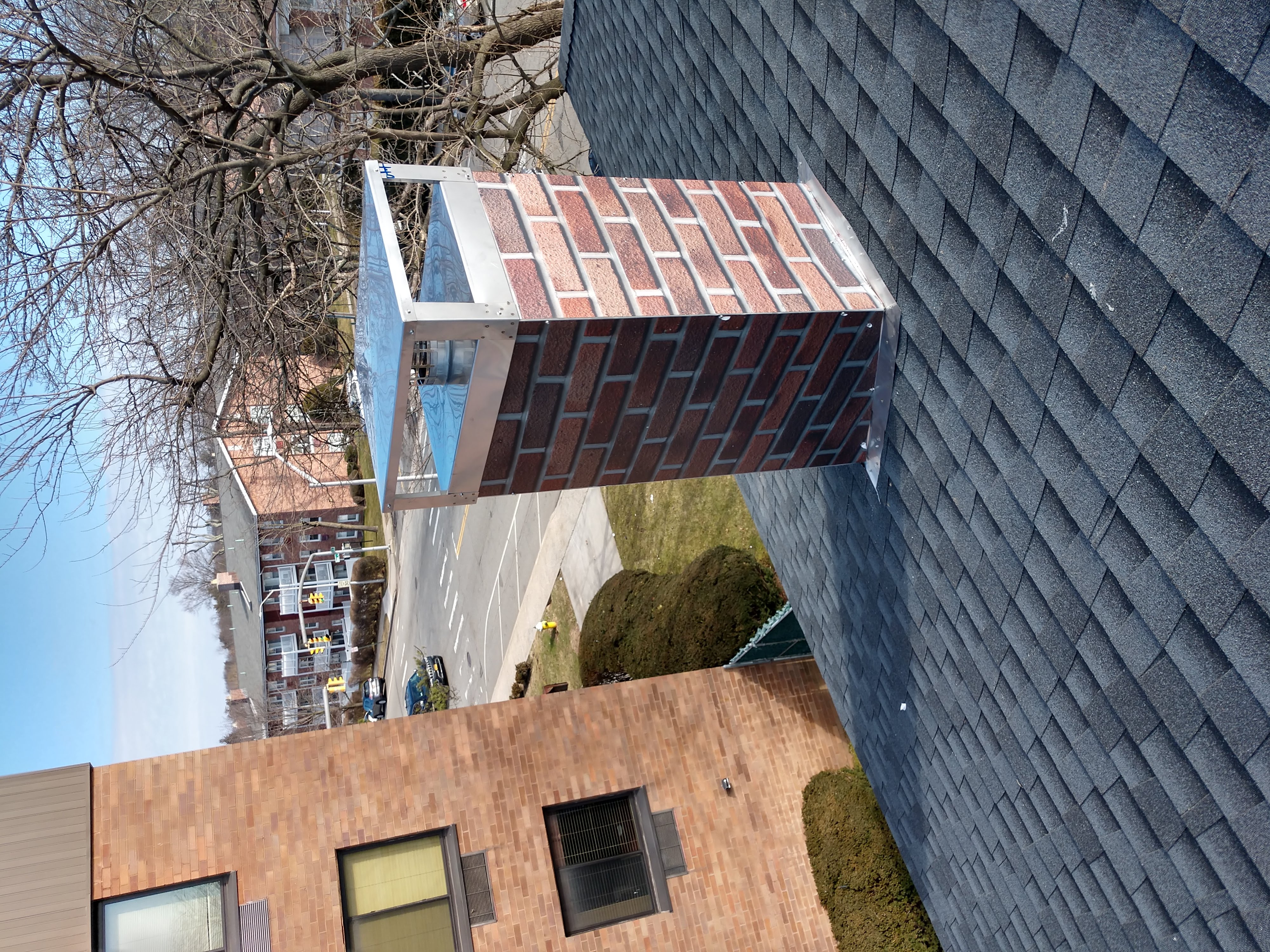 New elastomeric sealant applied to chimney crown in Roosevelt, NY